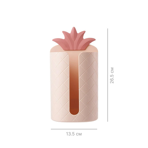 Wall-mounted napkin dispenser in the shape of a pineapple