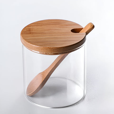 Set of glass spice jars with wooden lids