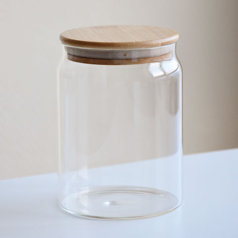 A glass jar with a bamboo lid