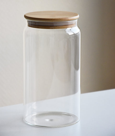 A glass jar with a bamboo lid