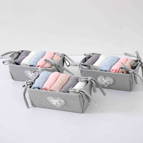Set of towels in a textile basket 25×25 cm 5 pcs