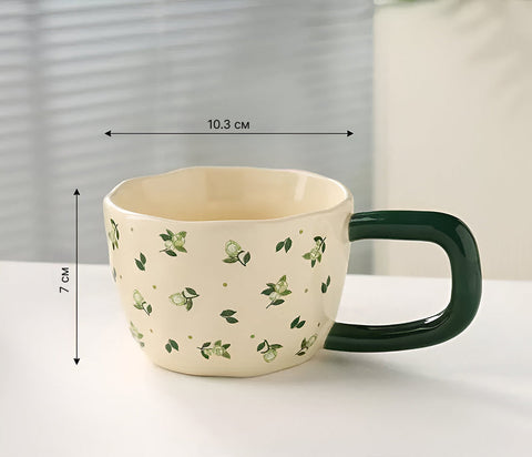 Ceramic cup with floral design