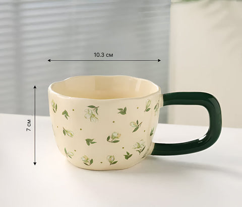 Ceramic cup with floral design