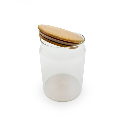 A glass jar with a bamboo lid