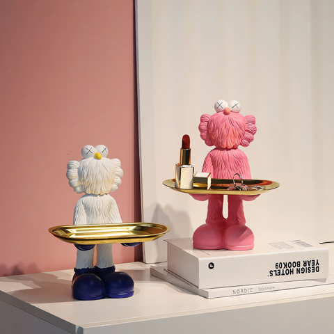 A statuette-holder and a stand for keys