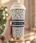 Тамблер «Lucky Cup» з чорними вензелями в руці