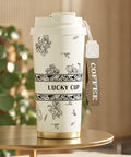 Тамблер «Lucky Cup» молочний із чорно-білим квітковим малюнком і ремінцем COFFEE