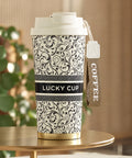 Тамблер «Lucky Cup» молочний із чорними вензелями і ремінцем COFFEE