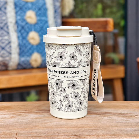 Стакан для кави «Flora» з чорним квітковим малюнком і ремінцем COFFEE